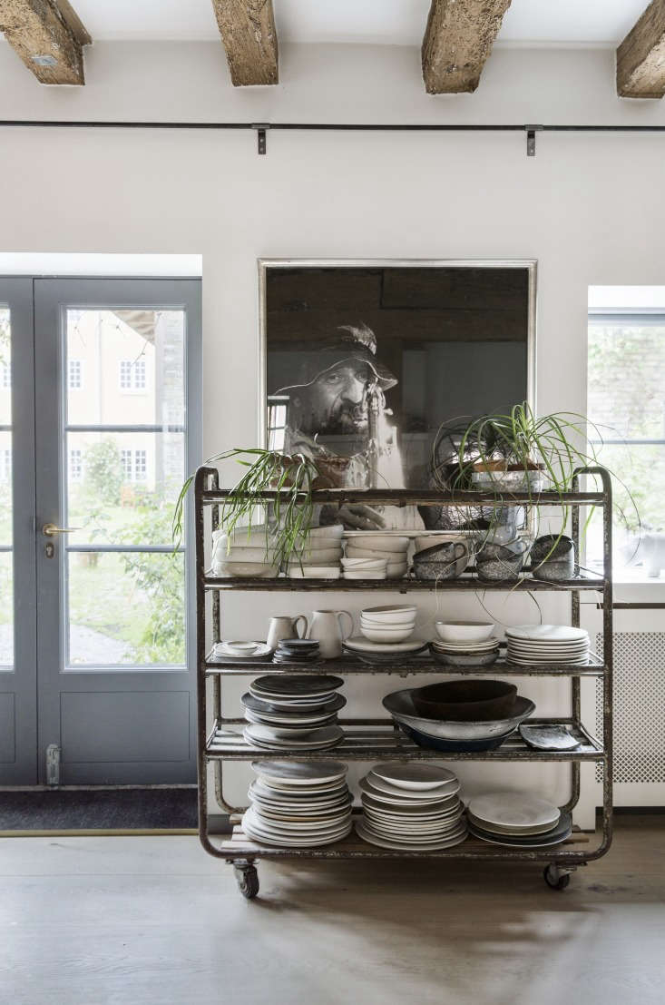 chefs rene and nadine redzepi stash an eclectic mix of ceramics on antique shel 17