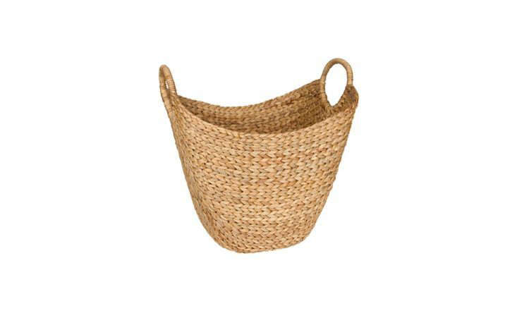 a woven seagrass basket with handles stores hammam style striped beach towels i 11