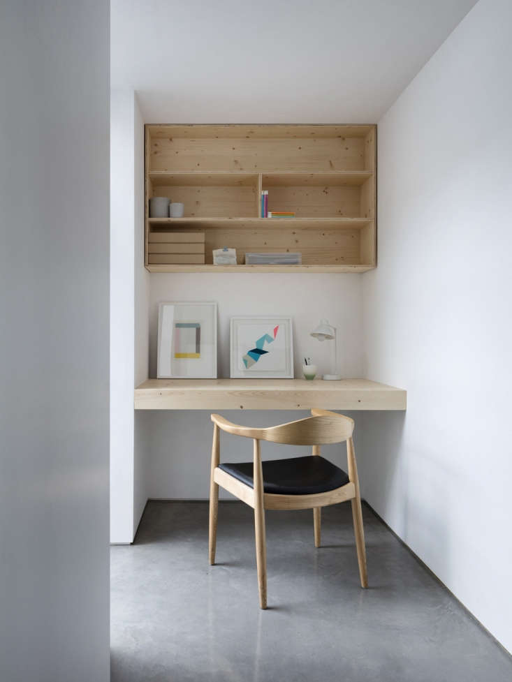 this floating desk and shelving were designed by paper house projects in the uk 9