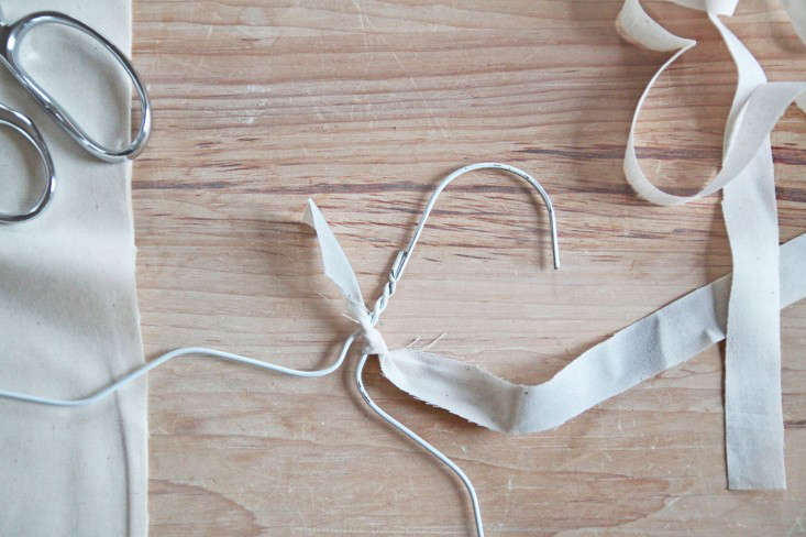 DIY Wrapped Muslin Hangers, tying fabric, Remodelista