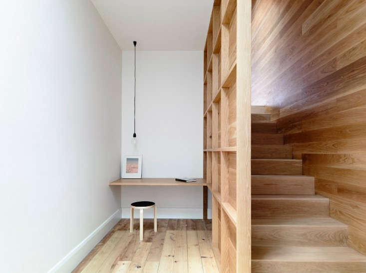 A workspace tucked next to a stairwell by Australia-based Rob Kennon Architects. Photograph by Derek Swalwell.