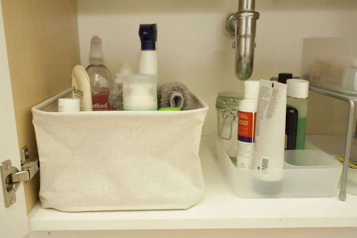 Products that I reach for daily are corralled at the front of a linen storage box. Mine are from Muji and are now discontinued. For similar soft bins, see 8 Favorites: Structured Cloth Bins for Everything (Even Unmentionables).