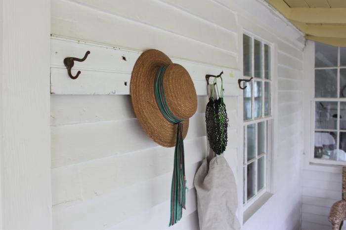 The finished product, made with a piece of salvaged board, holds beach items on my porch.