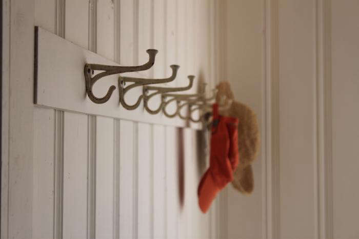 My Auntie Jessie made this custom coat hook rack for her guest room (see more of this home at Designskool).