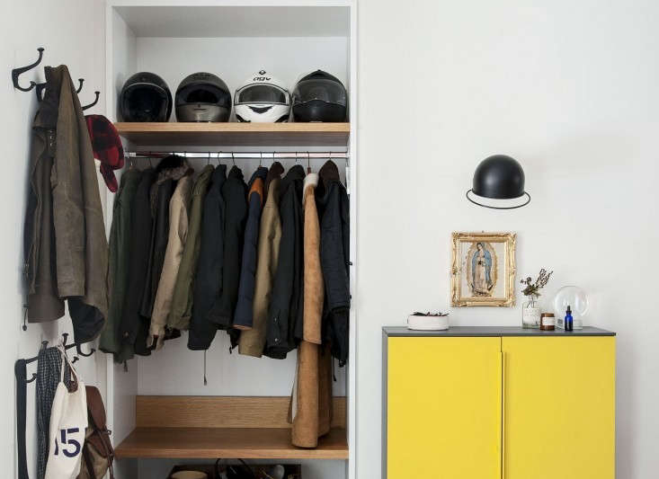 Open closet in the entry of a Brooklyn duplex designed by Oliver Freundlich | Remodelista