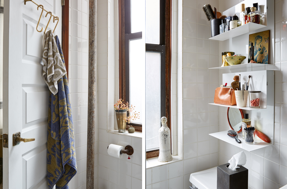 Small bathroom storage solution: wall shelves and door hooks 