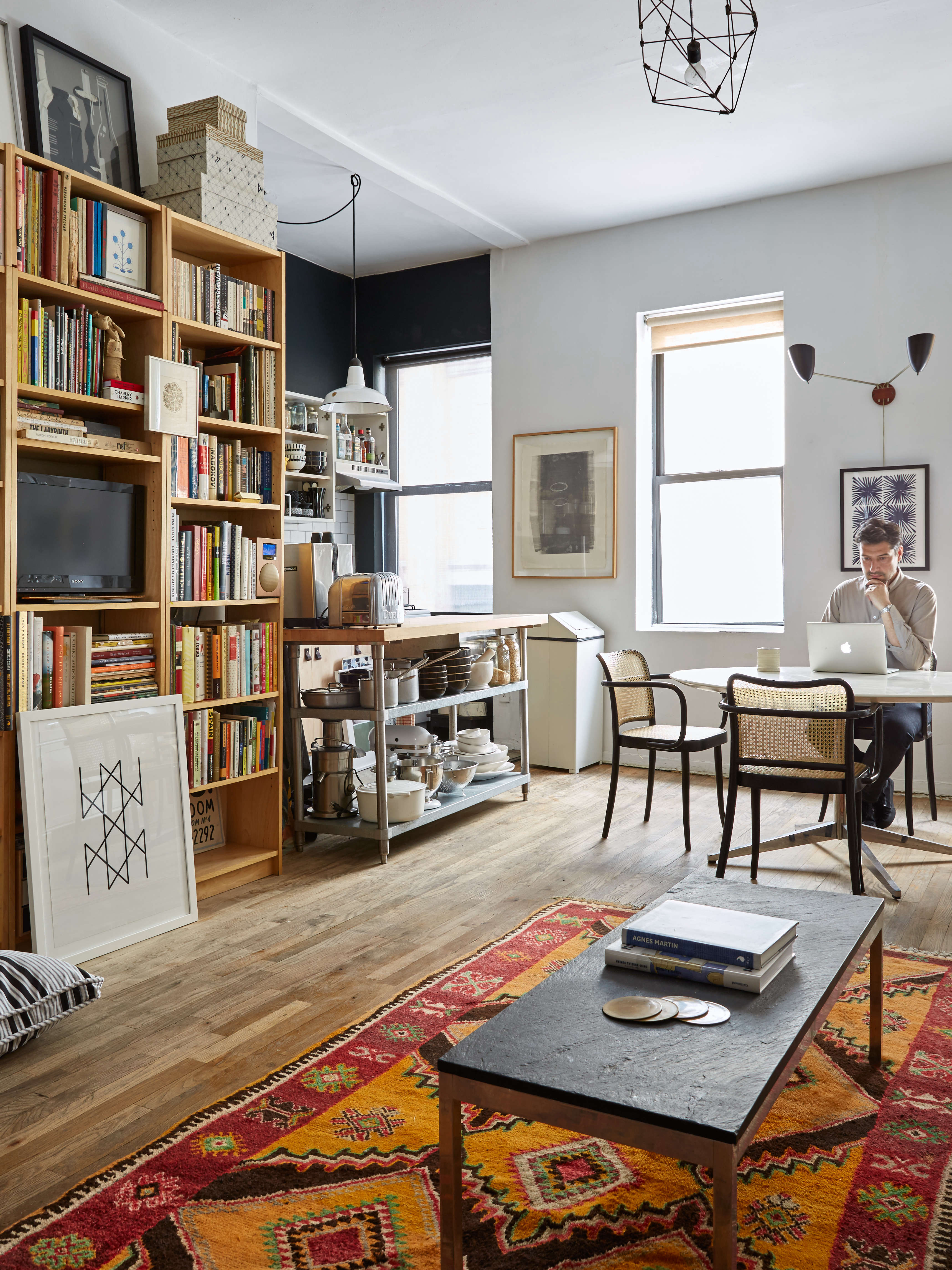 Roman Luba at home in his DIY remodeled NYC apartment | Kate Sears photo