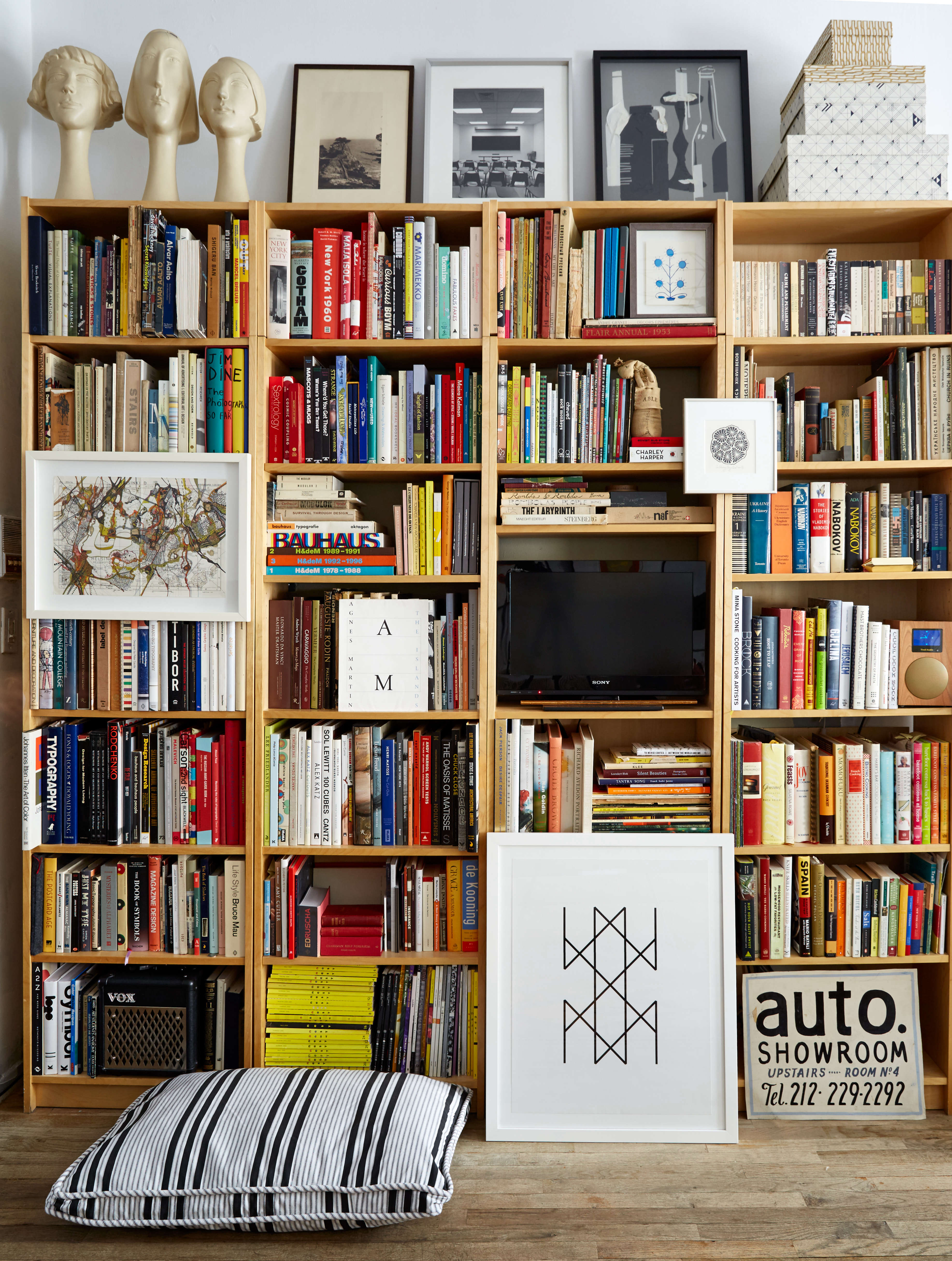 Wall-to-wall Ikea Billy bookshelves in Renata Bokalo and Roman Luba's NYC apartment 