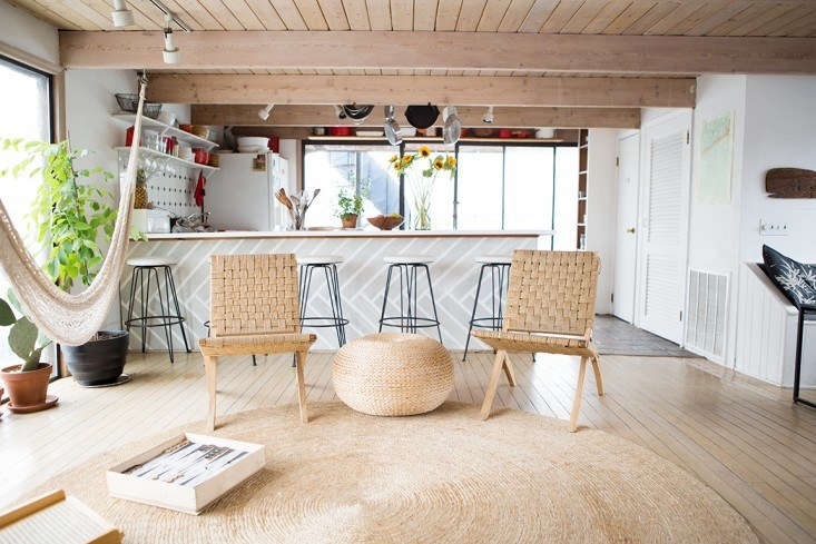 natural fiber rugs, like this one in the houseboat home of fredericks & mae 12