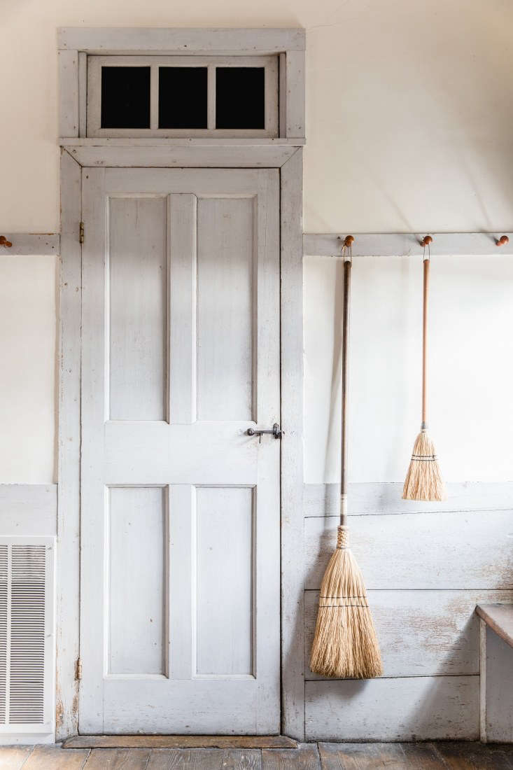 Hanging Brooms at Canterbury Shaker Village, Photo by Erin Little
