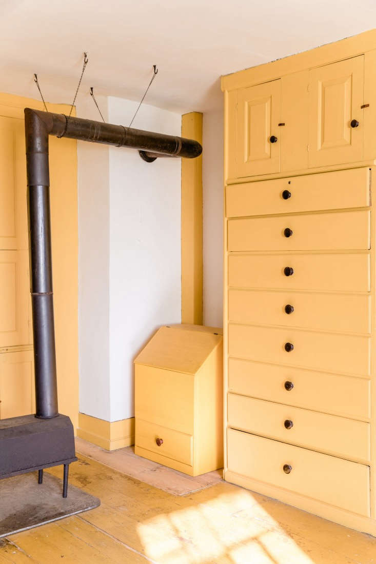 Yellow Cabinetry at Canterbury Shaker Village, Photo by Erin Little