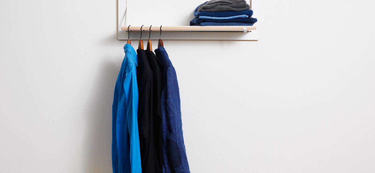 Flapps by Ambivalenz fold-down shelf and clothes hanger.