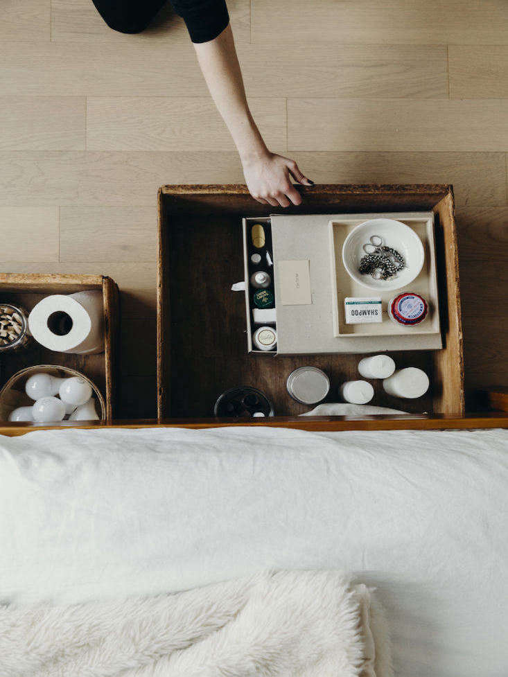 Does the area under your bed still look like a college student's dorm, packed with tupperware and loose socks? Annie Quigley found a solution to her storage woes: vintage Amish baking boxes.