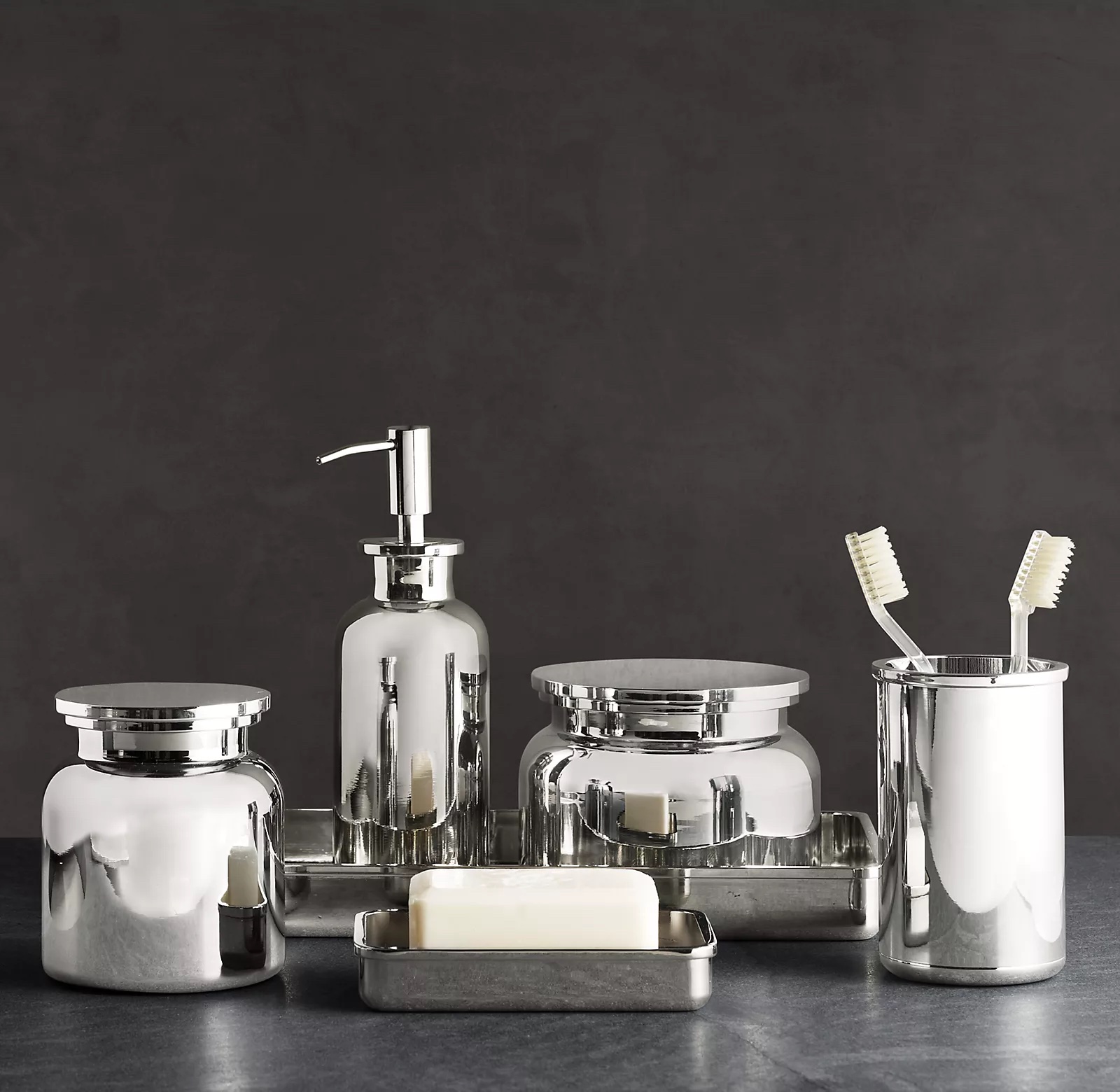 Restoration Hardware’s Pharmacy Metal Bath Accessories line adds a classic apothecary feeling to the bathroom. The soap dish contains a ribbed well to keep soap dry. Available in 5 finishes, including polished chrome; $70.
