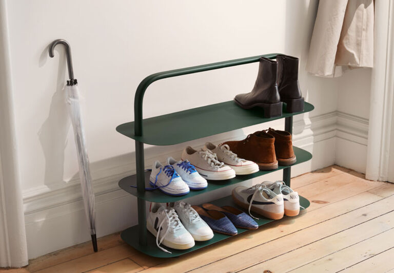 https://www.organized-home.com/wp-content/uploads/2023/04/open-space-shoe-storage-rack-cover-image-768x533.jpg